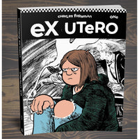 Book cover of 'ex Utero' by Charles Forssman on a wooden surface