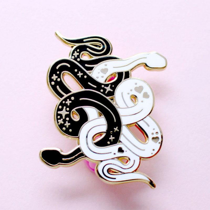 Black And White Snakes Enamel Pin
